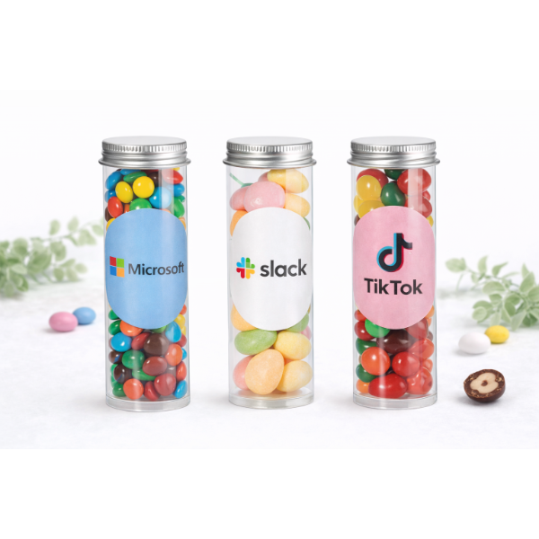 צילינדר ממתקים ממותג עם מילוי עדשים, מנטוס וג׳לי ולוגו חברה